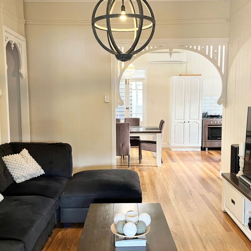 Charming Queenslander with Modern Upgrades and Ultimate Entertaining Space in Prime Location - Photo 1