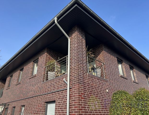 Entdecken Sie diese moderne 3-Zimmer-Oberwohnung mit Loggia in Moormerland-Veenhusen! - Photo 1