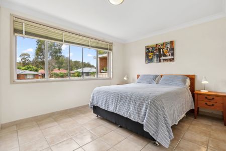Well-presented three-bedroom home in a quiet, family-friendly location. - Photo 4
