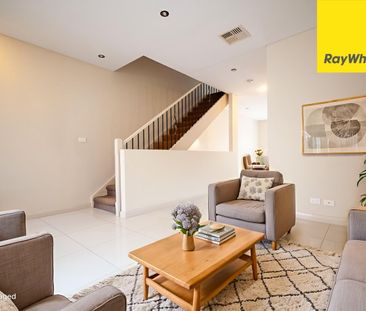 CONTEMPORARY THREE BEDROOM TOWNHOUSE IN MOST SOUGHT AFTER LOCATION - Photo 1