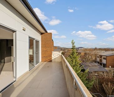 Modern Apartment Living with Scenic Mountain Views - Photo 3