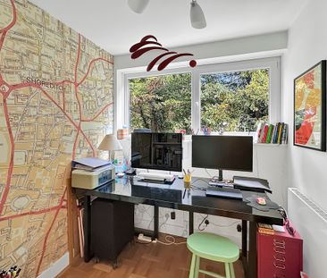 This three-bedroom apartment offers spacious living in a convenient... - Photo 6