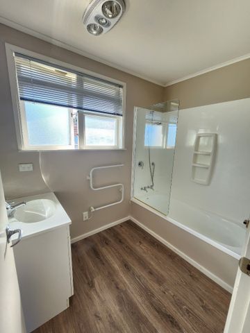 Tidy in Waitaua - Photo 4