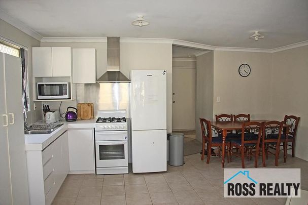 WELL-PRESENTED 3X1 HOME IN ULTRA-CONVENIENT LOCATION - Photo 1