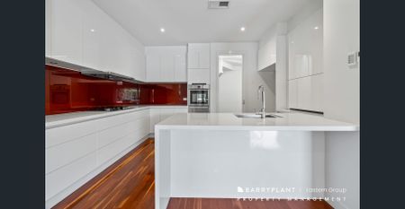 Light-Filled Elegance: Stunning Home with Alfresco Deck & Bosch Kitchen! - Photo 2