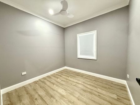 Fully Renovated Three-Bedroom Home with Carport Parking - Photo 4