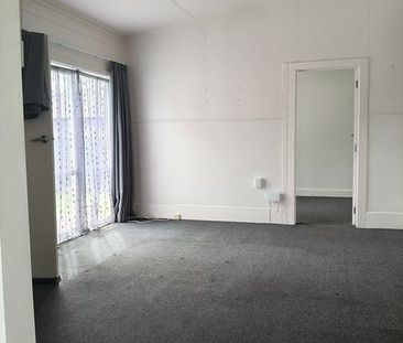 Easy care home right in town - Photo 1