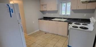 2 Bedroom Lower Suite, Parking, Storage + Huge Back yard! - Photo 2