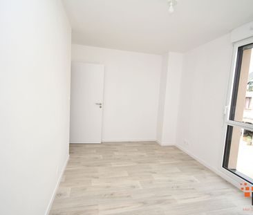 Location Appartement 3 pièces 61m² - Photo 3