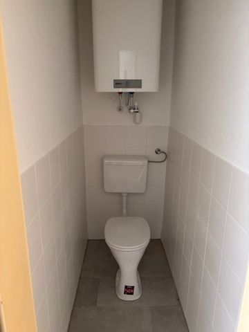 Helle 2-Zimmer-Wohnung im letzten Obergeschoss mit Loggia - Foto 5