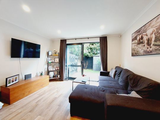 Stylish 2-Bedroom Home with Modern Comforts & Private Outdoor Spaces - Photo 1