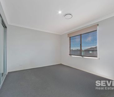 Spacious Family Haven in a Peaceful Neighbourhood - Photo 4