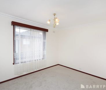 Elegant Family Living in a Prime Sunshine West Location - Photo 2