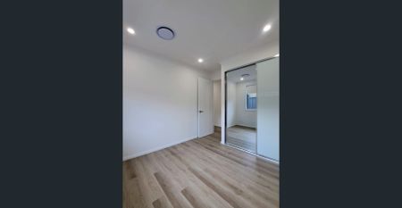 Brand New - 3-Bedroom House with Luxury Inclusions (Unit Two) - Photo 5