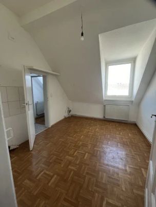 Gemütliche 2-Zimmer-Dachgeschosswohnung in MA-Wohlgelegen - Photo 1