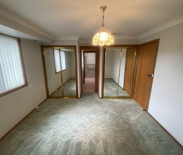Spacious Family Living with Beautiful Gardens & Ample Storage - Photo 1