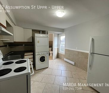 SPACIOUS 2 BED/1BATH UPPER UNIT! + HYDRO & WATER - Photo 1