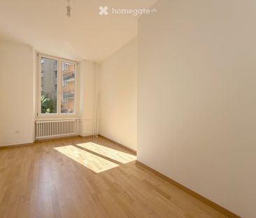 Zentrale helle Altbau-Wohnung mit moderner Küche und privatem Gartensitzplatz - Photo 1