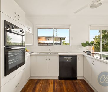 Brick Family Home with Balcony Charm & Pool - Photo 6