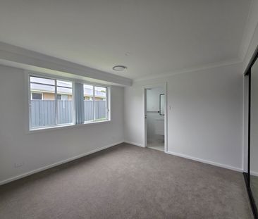Brand New 3-Bedroom Duplex in Sought-After Taree Estate - Photo 6
