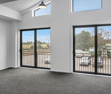 Industrial Loft Style Unit With Central Convenience & Water Views - Photo 2