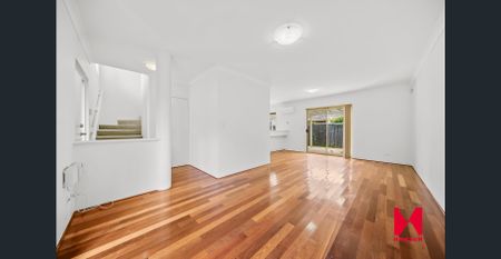 Spacious Riverside Townhouse in Prime Location - Photo 3