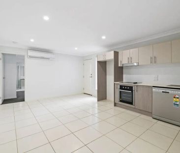 “Modern 1-Bedroom Unit with Garage & Outdoor Patio” - Photo 3