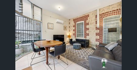 Unique 2-Bedroom Apartment in Heritage Building - Photo 2