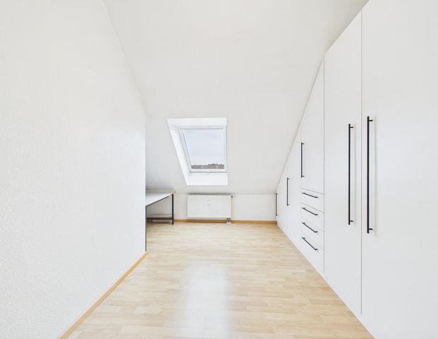 Äußerst attraktive 4-Zimmer-Maisonette mit Südbalkon, TG-Stellplatz und Ausstattungshighlights. - Photo 1