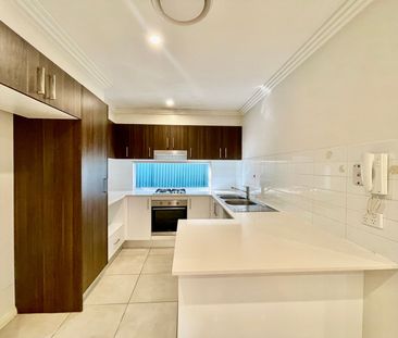 Modern & Spacious Living in a Prime Location! - Photo 1