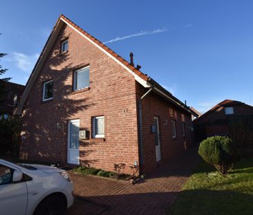 Zentral gelegene Obergeschosswohnung in Warsingsfehn - Foto 1