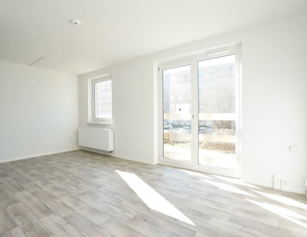 Mit Balkon und Hausgarten - Foto 1