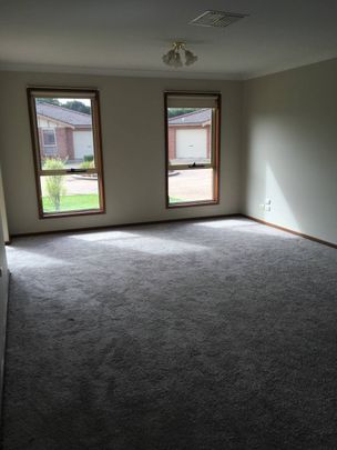 LOW MAINTENANCE, CENTRAL CONVENIENCE - Photo 1