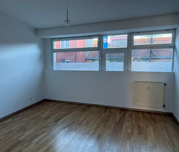 Verzorgd gelijkvloers 1-slpk appartement met tuin - Photo 4