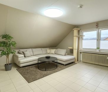 Großzügige Dachgeschosswohnung in Hasbergen-Ohrbeck - Photo 1