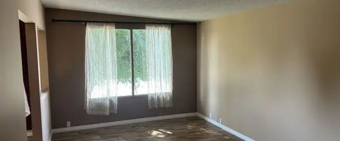 Quiet 2 bed room main floor in canyon meadows | 11722 Canfield Road Southwest, Calgary - Photo 1