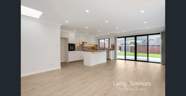 Modern Family Home Offering Space, Style and Convenience! - Photo 1