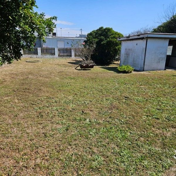 Create ListinCharming 3-Bedroom Home with Modern Amenities in Prime Acacia Ridge Locationg - Photo 1