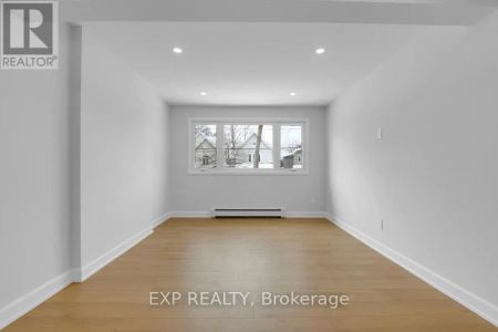 1 - 555 CHURCHILL AVENUE N - Photo 2