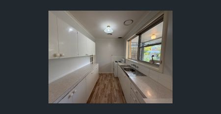 Convenient location & low maintenance - Photo 3