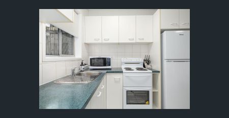 TIDY UNIT STEPS FROM THE BEACH` - Photo 3