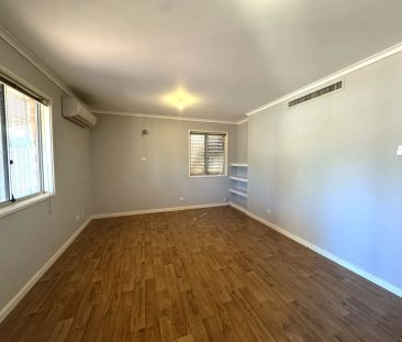 Fully Fenced Brick Home - Photo 1