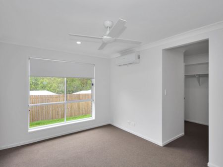 Brand New Elevated Hampton’s Style Home – Family Living at Its Best - Photo 2