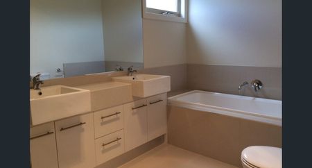 Register to Inspect // Stylish Two-Bedroom Townhouse with Dual Living Spaces - Photo 4