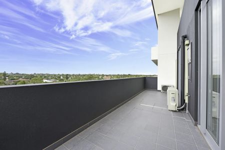 Top-Floor Penthouse with Dual Balconies | District Views - Photo 4