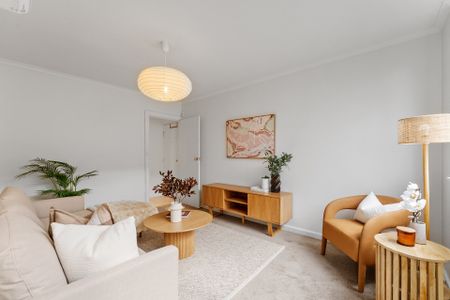 Sunlit Apartment Living Steps from Rathdowne Village Charm - Photo 4