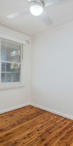 Air-conditioned one bedroom unit with extra large garage - Photo 3