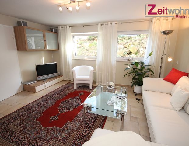 Exklusive möblierte Souterrain-Wohnung mit Terrasse in ruhiger Lage - Photo 1