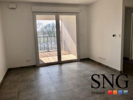 T2 AVEC LOGGIA ET UN PARKING INTERIEUR - Photo 4