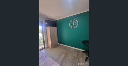 PARTIALLY FURNISHED - MOVE STRAIGHT IN - Photo 2